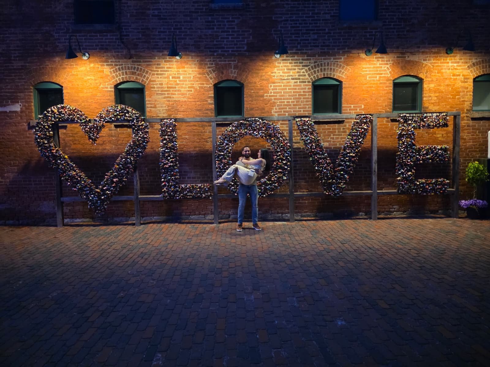 Jennifer and Samir at the LOVE sign