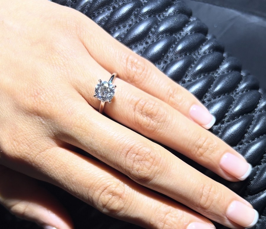 Jennifer's engagement ring on her hand